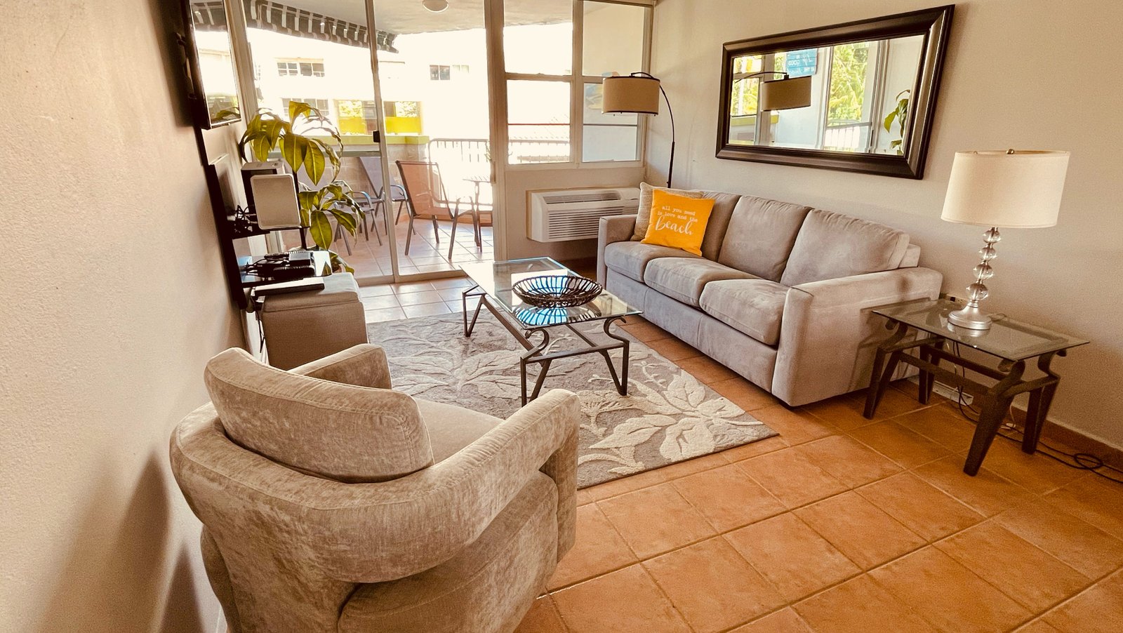 Living area with sofa bed at Rainforest Beach Condo